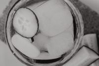 Kaboompics - Water glass - cucumber - ice cubes - bw - black & white
