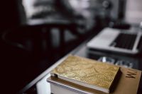 Kaboompics - Close-up of golden journals