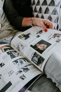 Kaboompics - Woman read a magazine