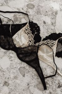 Kaboompics - Black lace bras and beige satin bra