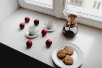Kaboompics - Delicious morning freshly brewed filter coffee with cookies and plum fruits