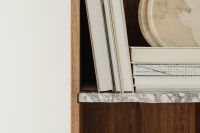 Kaboompics - Books on a bookcase - marble shelves