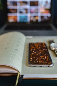 Kaboompics - Home office desk with Macbook, iPhone, calendar, watch & organizer