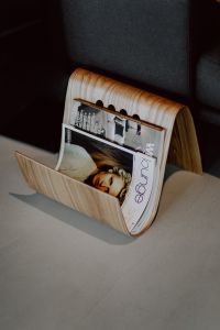 Kaboompics - Wooden magazine rack
