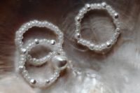 Kaboompics - Pearl and white bead rings