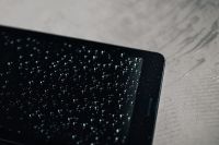 Kaboompics - Wet black tablet