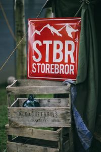 Kaboompics - Red sign and wooden crates in a garden