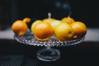 Oranges on a crystal plate