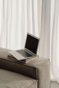 Kaboompics - Home office on the sofa - books - laptop - MacBook