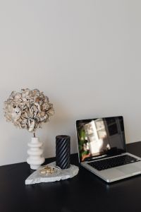 Laptop - computer - desk - black candle - dried flower