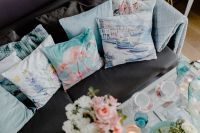 Kaboompics - Blue pillows on a comfy sofa