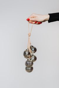 Hands holding bauble