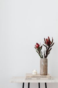 Kaboompics - LEUCADENDRON SAFARI SUNSET - dried flower - candle - marble vase - glasses