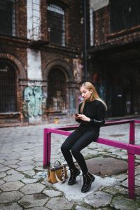 Portrait of young woman on the street