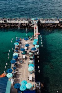 Kaboompics - Pier with umbrellas at the seaside, Sorrento beaches, Italy