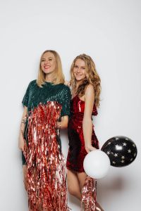 Kaboompics - Women Celebrate on a white Background with Balloons and Confetti