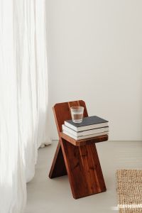 Kaboompics - Glass of water - wooden stool - books