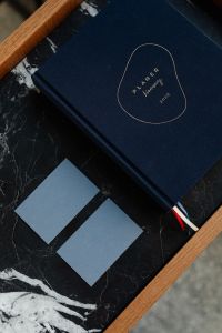 Kaboompics - Empty business card & planner on marble