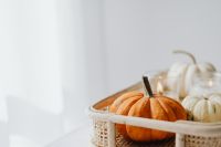 Kaboompics - Pumpkins - basket - candles