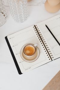 Kaboompics - Coffee & Weekly Planner on Marble