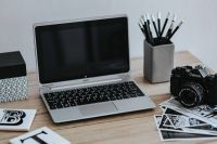 Kaboompics - Black-and-white photos with a silver laptop, a smartphone and a camera