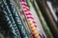 Kaboompics - Collection of design fabrics on hangers