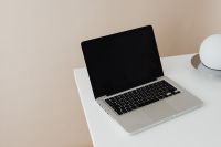 Kaboompics - Laptop and coffee - empty screen - mockup