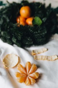 Kaboompics - Still life of mandarin oranges with leaves