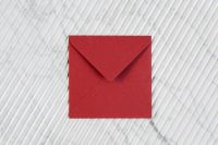Red envelope on marble