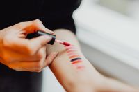 Kaboompics - Lipstick swatches on woman hand
