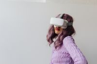 Kaboompics - Young woman wearing neon clothes - VR goggles - virtual reality