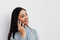 Kaboompics - Asian woman talking on the phone