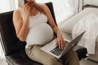 Kaboompics - Pregnant Woman Working on Laptop at Home