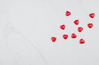 Kaboompics - Valentine Background with Red Hearts on a white Marble