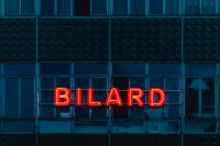 Neon sign Bilard on the building
