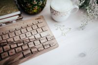 Kaboompics - Wooden keyboard and cup of coffee