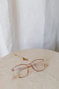 Kaboompics - Corrective glasses lie on a marble table