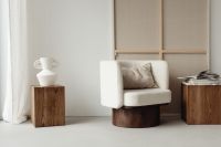 Kaboompics - Open book - auxiliary table - cube - walnut wood - pedestal - sculpture - upholstered armchair