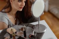Kaboompics - Young beautiful woman doing her make up