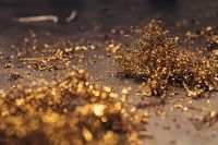 Kaboompics - Close-ups of golden metal shavings on a table