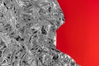 Kaboompics - Silver Foil Texture & Red Background