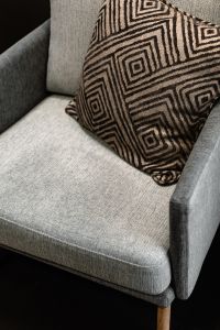 Kaboompics - Grey armchair and pillow