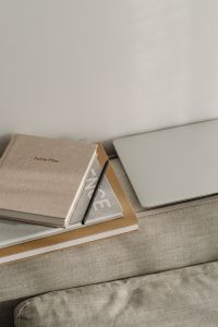 Kaboompics - Home office on the sofa - laptop - books - notebook - organizer - planner