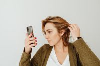 Kaboompics - Woman uses mobile phone