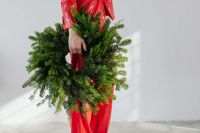 Woman with Christmas Wreath