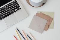 Kaboompics - Laptop and pencils on desk - envelopes