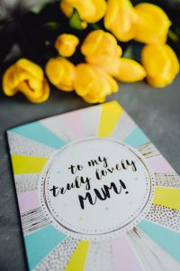 Mother`s Day card with colorful tulip flowers