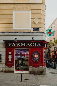 An old-fashioned pharmacy with an antique window in Madrid