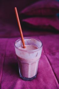 Kaboompics - Fresh and healthy fruit milkshake with a straw