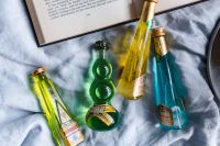 Kaboompics - Group of colorful little bottles with liqueurs